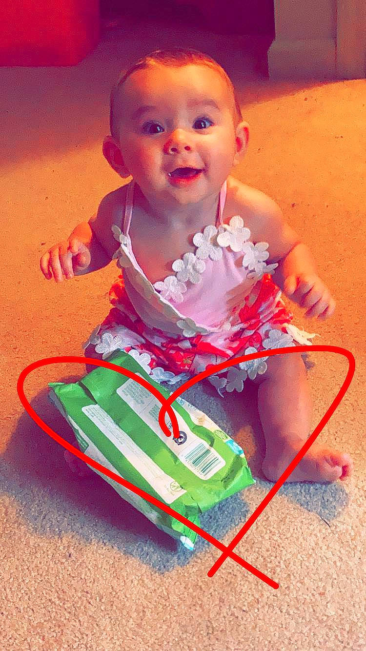 Ellianna Wrenn Mc is registered to the contest to win money with this photo: baby, baby_products, baby_toddler_clothing, child, fun, grass, happy, head, magenta, pattern, person, play, sitting, sleeve, smile, toddler