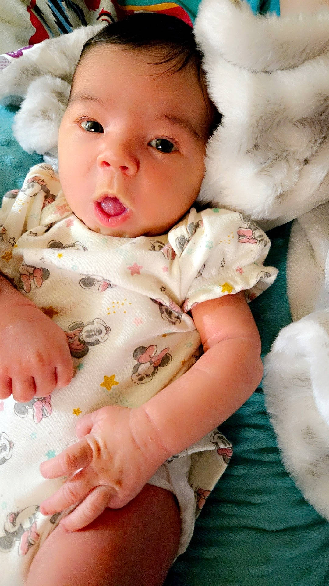 architecture, baby, bed, blanket, bodypart, building, clothing, face, finger, furniture, glove, hand, head, homedecor, hospital, newborn, person, photography, portrait, quilt