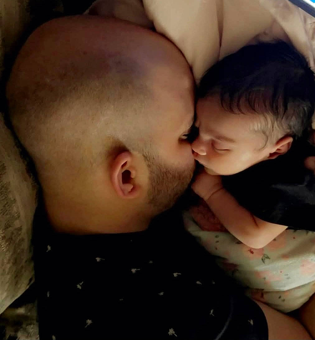 Everleigh is registered to the contest to win money with this photo: baby, bed, bedroom, blanket, cushion, face, furniture, head, homedecor, hugging, indoors, kissing, newborn, people, person, photography, portrait, romantic, room, sleeping