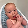 baby, child, bath, bathtub, blue_bath_seat, skin, wet, hands, face, curious, infant, person, cute, water, clean, indoor, plump, expression, young, naked