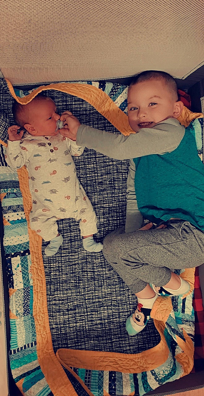 Cole is registered to the contest to win money with this photo: baby, baby_products, child, comfort, cool, fun, hairstyle, happy, human_body, human_leg, lap, leg, leisure, pattern, person, shoe, standing, thigh, tints_and_shades, toddler