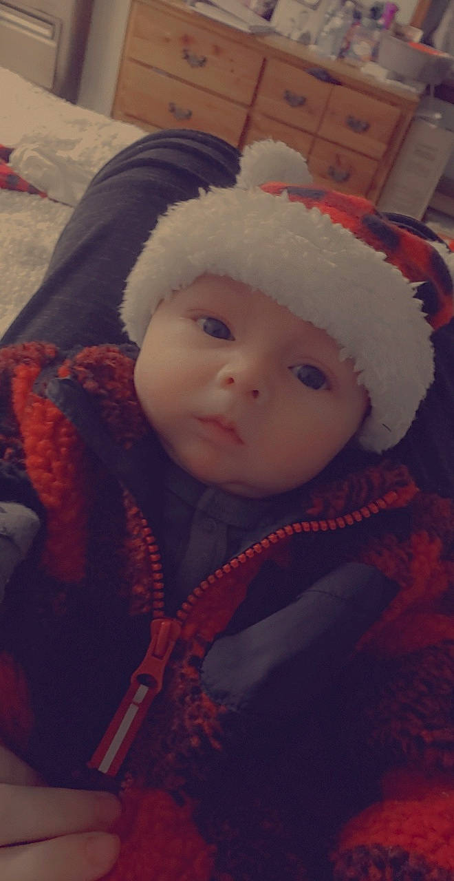 Azriel joined the competition — help win amazing prizes! baby, cap, cheek, child, chin, close_up, comfort, eye, fur, fur_clothing, happy, headgear, headwear, human_body, iris, knit_cap, lip, nose, person, skin