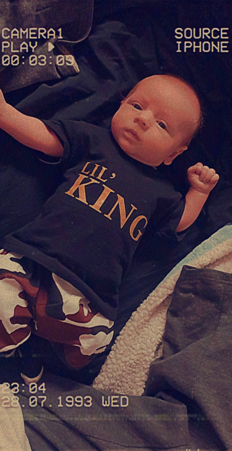 Azriel is registered to the contest to win money with this photo: art, baby, baby_sleeping, baby_toddler_clothing, beauty, child, comfort, cool, face, font, fun, hand, happy, linens, orange, person, photo_caption, sleeve, t_shirt, tints_and_shades