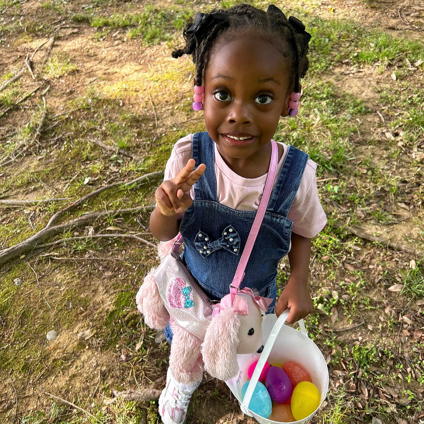 Kiari is registered to the contest to win money with this photo: child, clothing, face, female, food, footwear, girl, grass, head, nature, outdoors, park, person, photography, plant, portrait, purple, sitting, soil, sweets