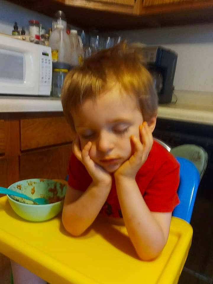 Derrek is registered to the contest to win money with this photo: chair, child, comfort_food, cooking, desk, dishware, home_appliance, kitchen, kitchen_appliance, mixing_bowl, person, play, room, serveware, sharing, sitting, t_shirt, table, tableware, thumb