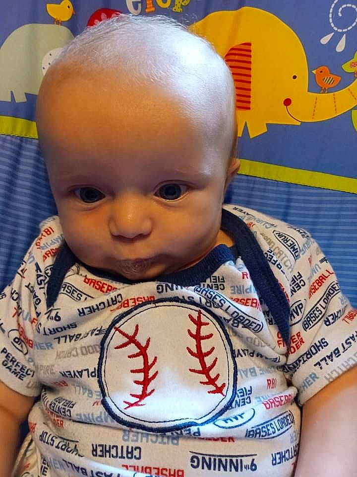 Cliffard is registered to the contest to win money with this photo: art, baby, baby_toddler_clothing, ball, cheek, chin, cool, eye, eyebrow, face, forehead, fun, happy, head, mouth, nose, person, skin, sleeve, t_shirt