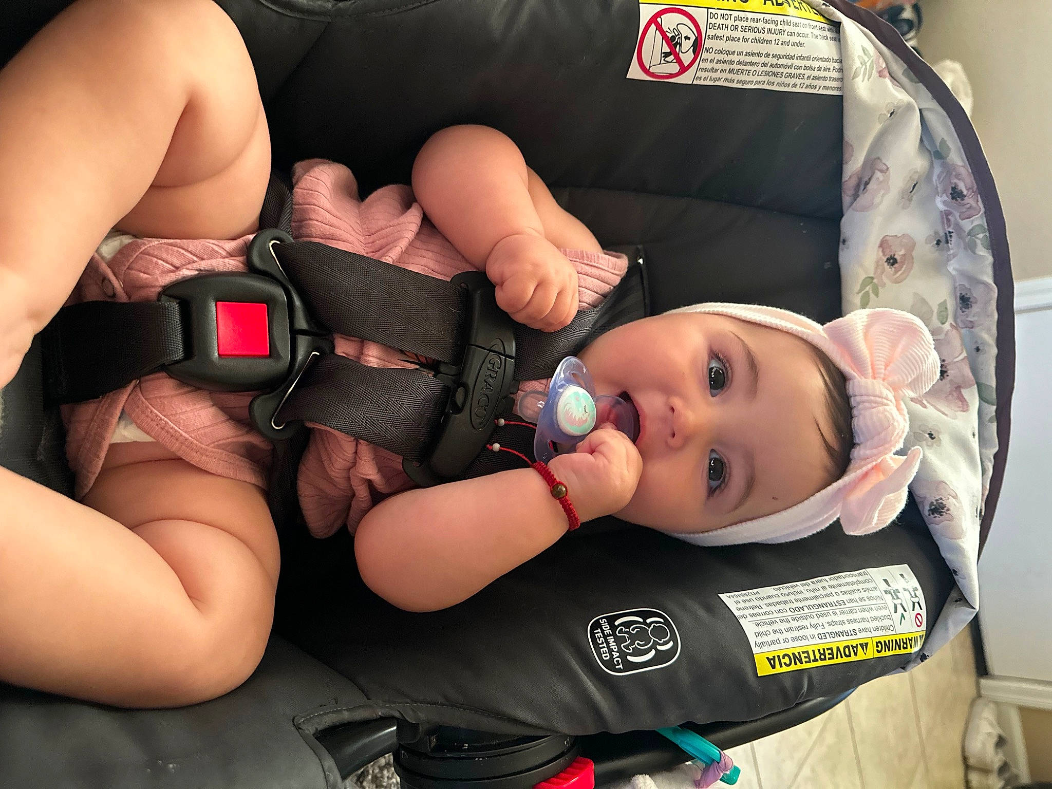 Aria is registered to the contest to win money with this photo: auto_part, baby, baby_carriage, baby_products, baby_toddler_clothing, car_seat, chest, child, comfort, elbow, fashion_accessory, human_leg, knee, mouth, nail, person, product, thigh, thumb, toddler