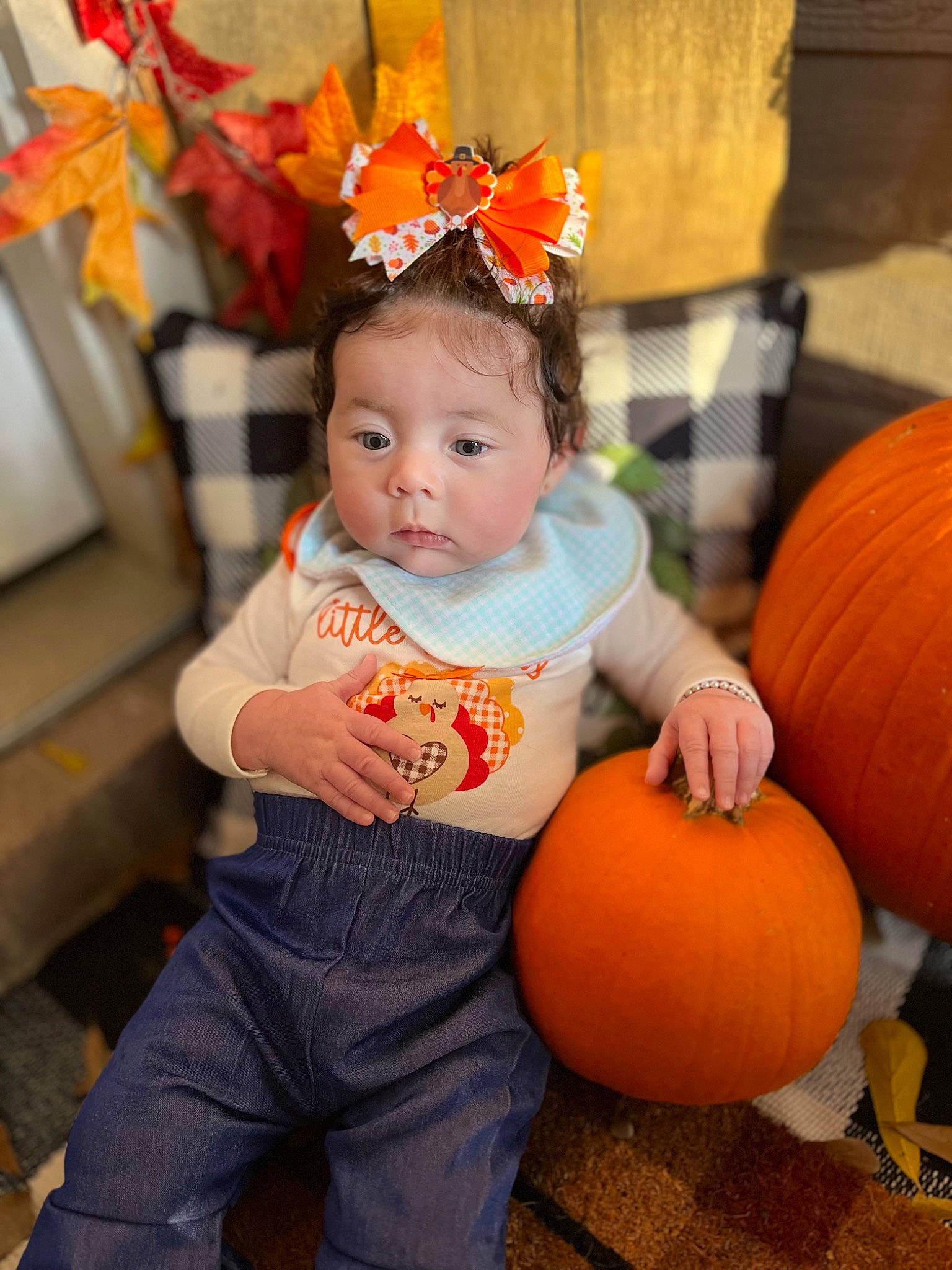 Averi is registered to the contest to win money with this photo: baby, baby_toddler_clothing, calabaza, child, cucurbita, eye, facial_expression, fruit, fun, gourd, happy, head, human_body, natural_foods, orange, person, plant, pumpkin, squash, toddler