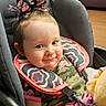 Eve joined the competition — help win amazing prizes! baby, bow, camo_clothing, car_seat, child, couch, cute, decor, expression, floor, furniture, happy, headwear, indoors, person, pink, plush_toy, seat_belt, smiling, window