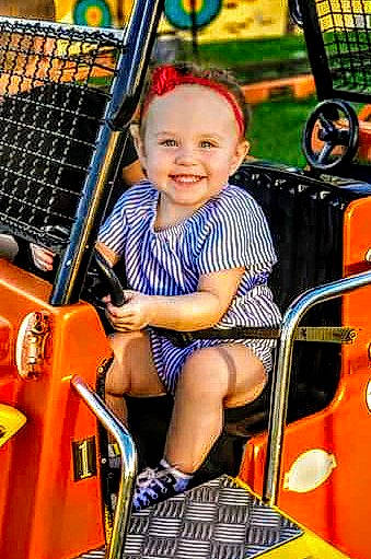 Carleigh joined the competition — help win amazing prizes! amusement_park, amusement_ride, child, city, fun, human_settlement, joy, leisure, nonbuilding_structure, park, person, play, playground, product, public_space, recreation, sitting, smile, toddler, vacation