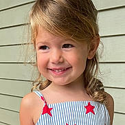 Freya joined the competition — help win amazing prizes! child, smiling, blonde_hair, curly_hair, dress, stars, striped, portrait, happy, face, shoulder, outdoor, person, young, cute, skin, head, eyebrows, eyes, background