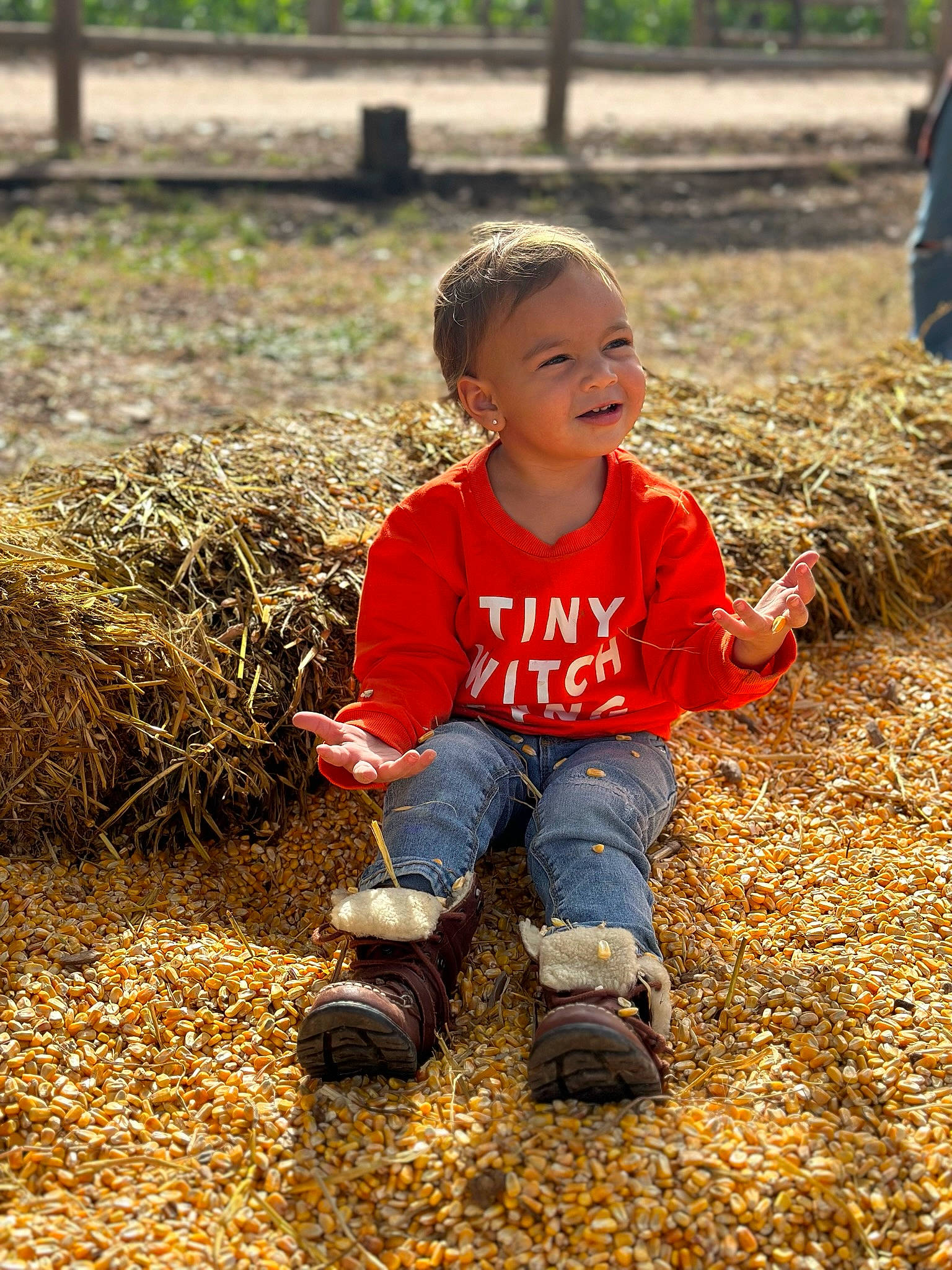 Thalia Arielle is registered to the contest to win money with this photo: baby_toddler_clothing, child, deciduous, fun, grass, happy, landscape, leisure, people_in_nature, person, plant, play, playing_with_kids, recreation, sitting, smile, soil, spring, toddler, tree