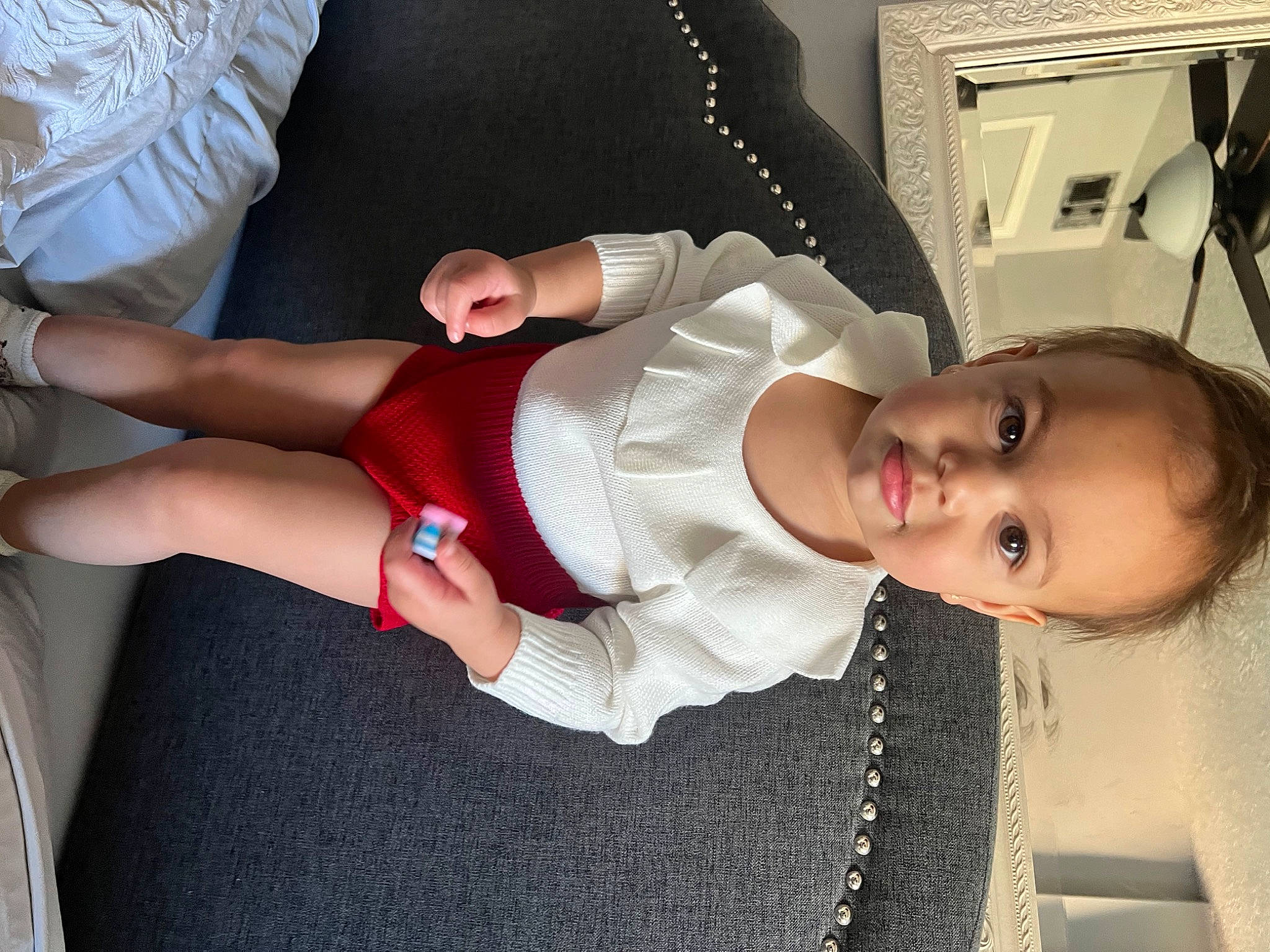Thalia Arielle is registered to the contest to win money with this photo: abdomen, baby, baby_toddler_clothing, comfort, elbow, finger, gesture, hand, human_body, joint, knee, lap, leg, mouth, person, shoulder, sleeve, sock, thigh, toddler