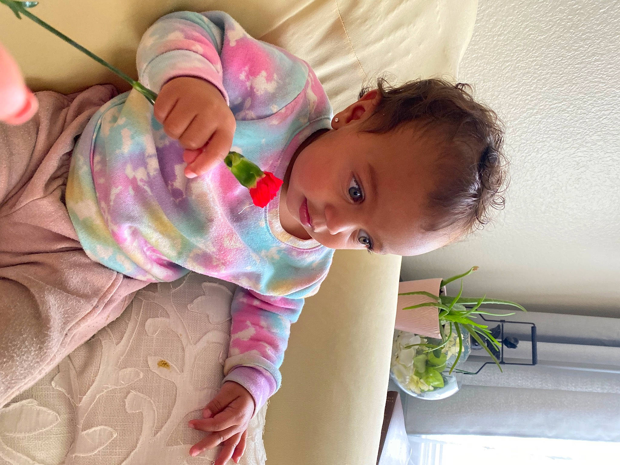 Tiara Royalty is registered to the contest to win money with this photo: baby, baby_products, baby_toddler_clothing, cheek, child, comfort, ear, eyelash, finger, happy, linens, nail, pattern, person, play, room, skin, sleeve, toddler