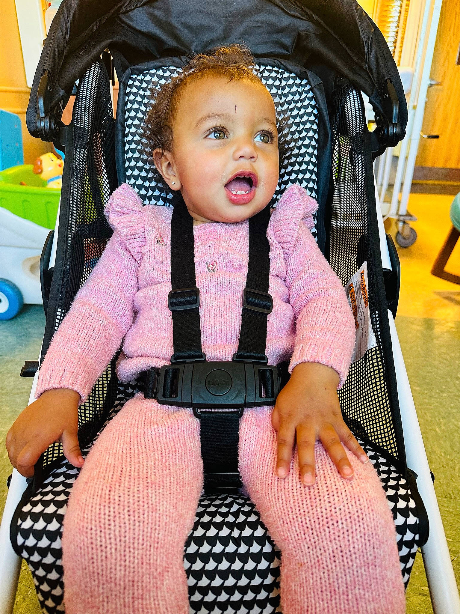 Tiara Royalty joined the competition — help win amazing prizes! baby, baby_carriage, baby_products, baby_safety, baby_toddler_clothing, black, chair, cheek, child, comfort, fun, leisure, person, photograph, pink, sitting, skin, snapshot, surprise, thigh