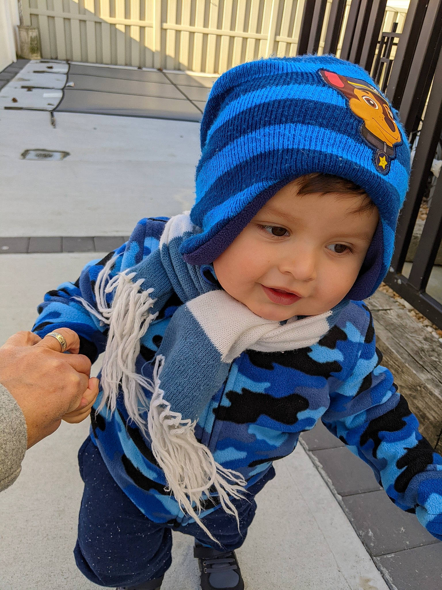 Frankie is registered to the contest to win money with this photo: baby, baby_toddler_clothing, beanie, blue, cap, child, electric_blue, fashion_accessory, freezing, fun, happy, headgear, headwear, knit_cap, leisure, pattern, person, plant, smile, toddler