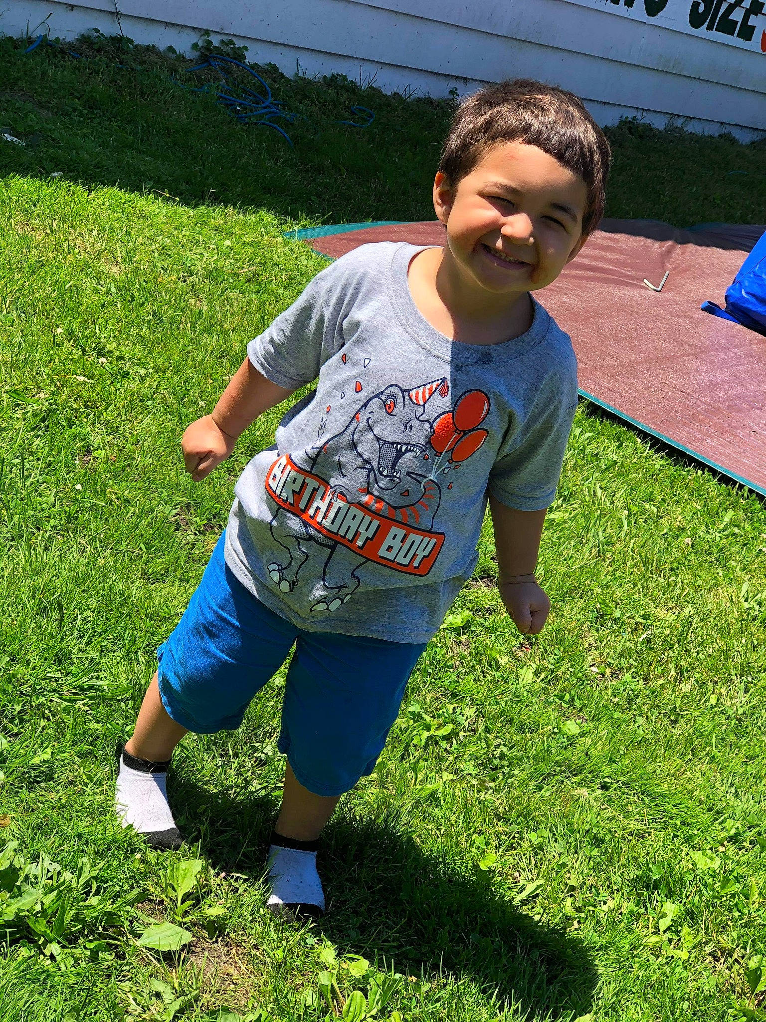 Erick is registered to the contest to win money with this photo: child, fun, grass, grass_family, green, joy, lawn, leisure, person, plant, recreation, summer, t_shirt, vacation, youth