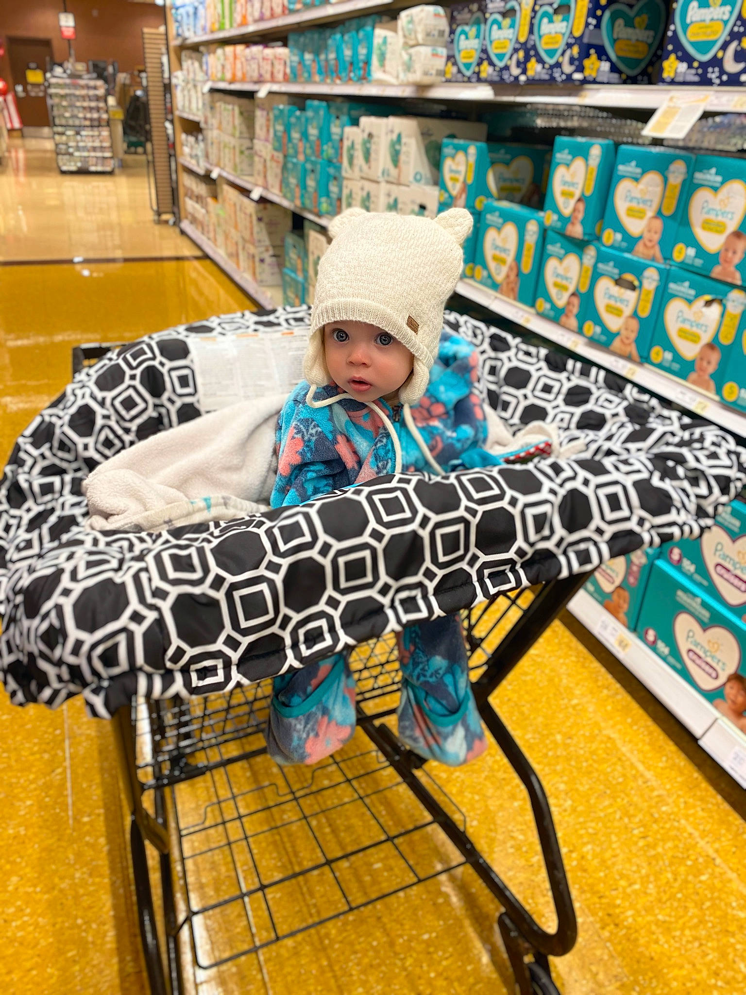 June joined the competition — help win amazing prizes! baby, baby_carriage, baby_products, bag, cart, comfort, electric_blue, flooring, fun, hat, headwear, leisure, pattern, person, product, shelf, shopping, shopping_cart, sitting, tire
