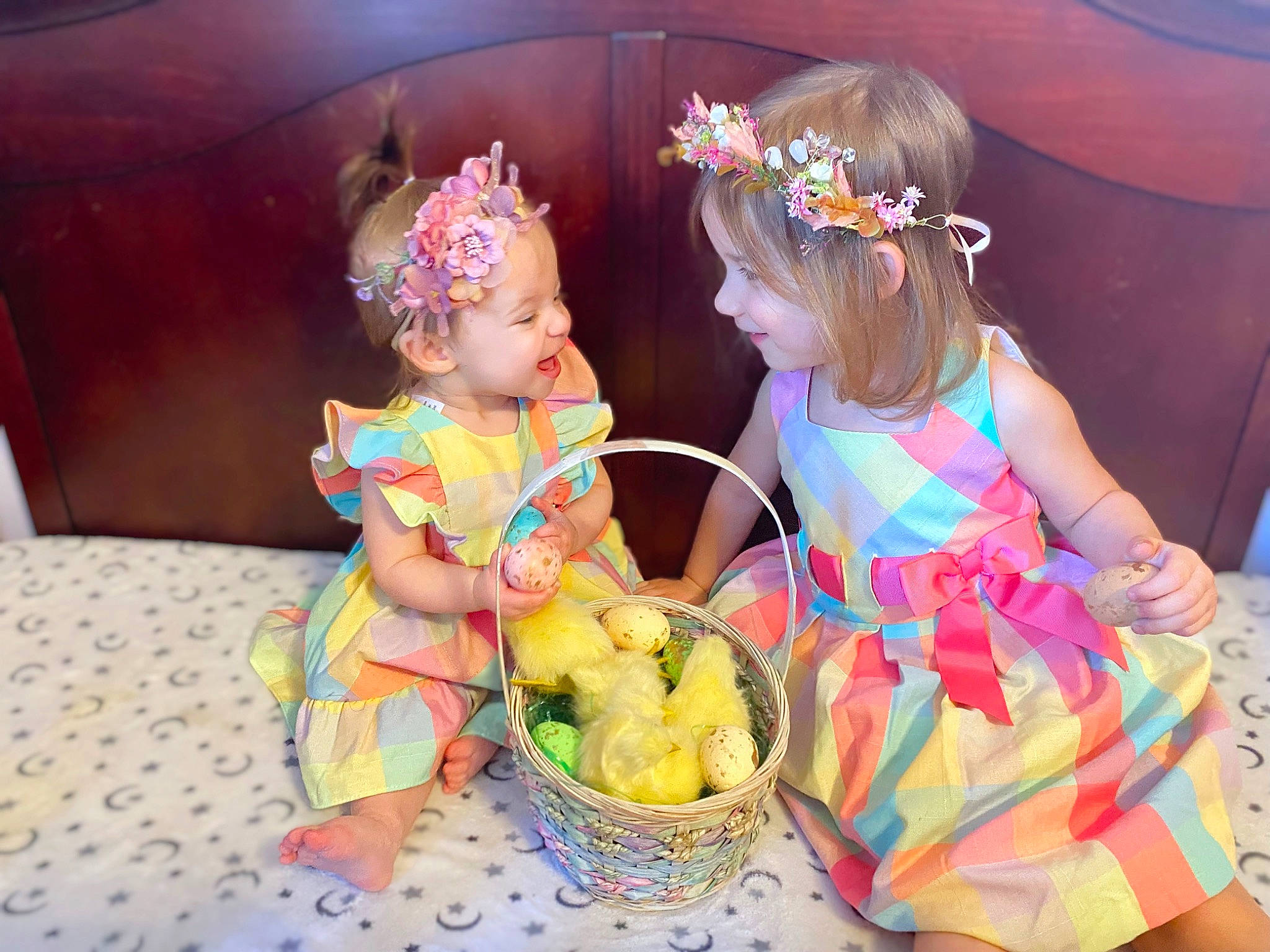 June is registered to the contest to win money with this photo: baby, baby_toddler_clothing, child, costume, dress, entertainment, event, facial_expression, fashion_accessory, fun, happy, headpiece, headwear, party, party_supply, pattern, performing_arts, person, pink, sweetness