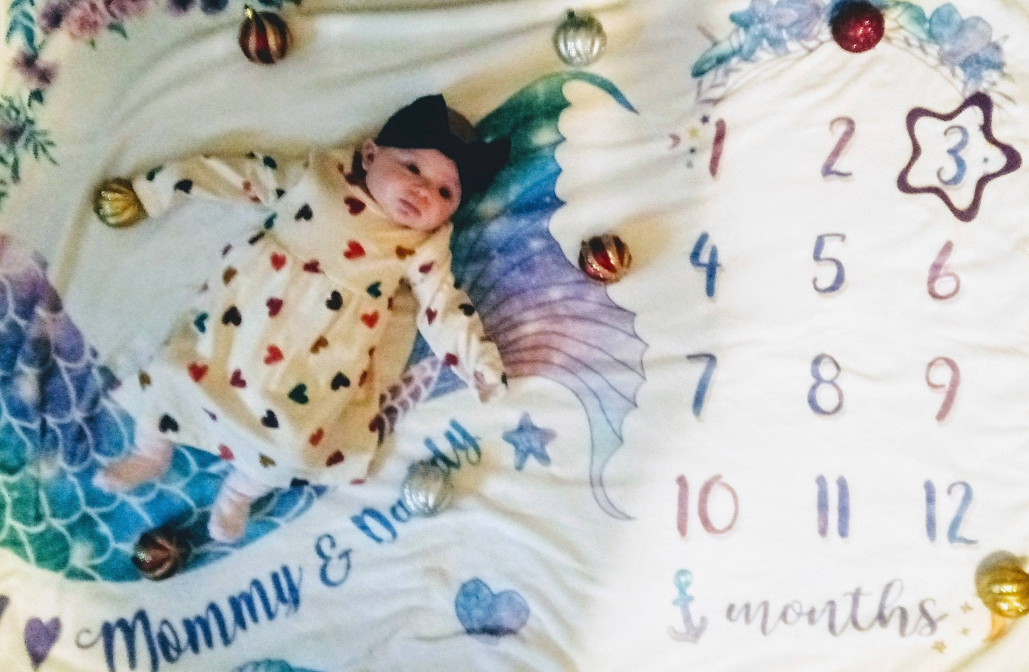 Amanda is registered to the contest to win money with this photo: baby, baby_products, baby_toddler_clothing, child, circle, craft, event, font, happy, headwear, linens, organism, paper, paper_product, pattern, person, polka_dot, porcelain, sleeve, textile