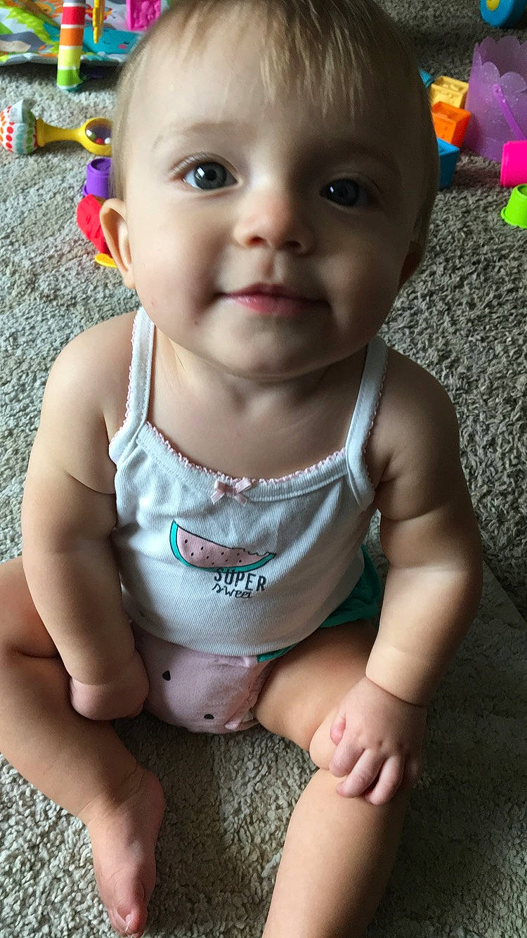 Zoey is registered to the contest to win money with this photo: boy, cheek, child, eye, face, finger, fun, girl, hand, happiness, head, human_hair_color, infant, iris, mouth, organ, person, play, skin, smile