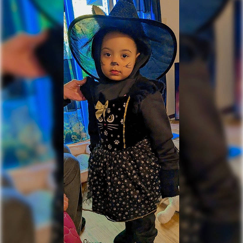 Nalani is registered to the contest to win money with this photo: art, baby_toddler_clothing, cap, costume_hat, electric_blue, fashion_accessory, fashion_design, fun, happy, hat, magenta, pattern, person, sleeve, smile, snapshot, sun_hat, t_shirt, textile, toddler