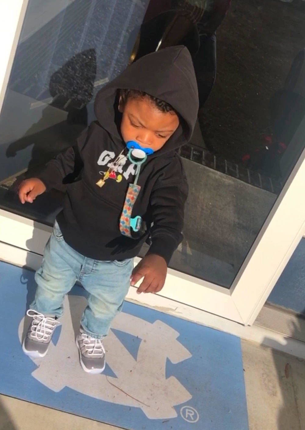 Khamari joined the competition — help win amazing prizes! bag, baseball_cap, cap, child, cool, denim, electric_blue, flooring, fun, human_leg, leisure, pattern, person, room, sitting, sleeve, sneakers, t_shirt, tints_and_shades, toddler