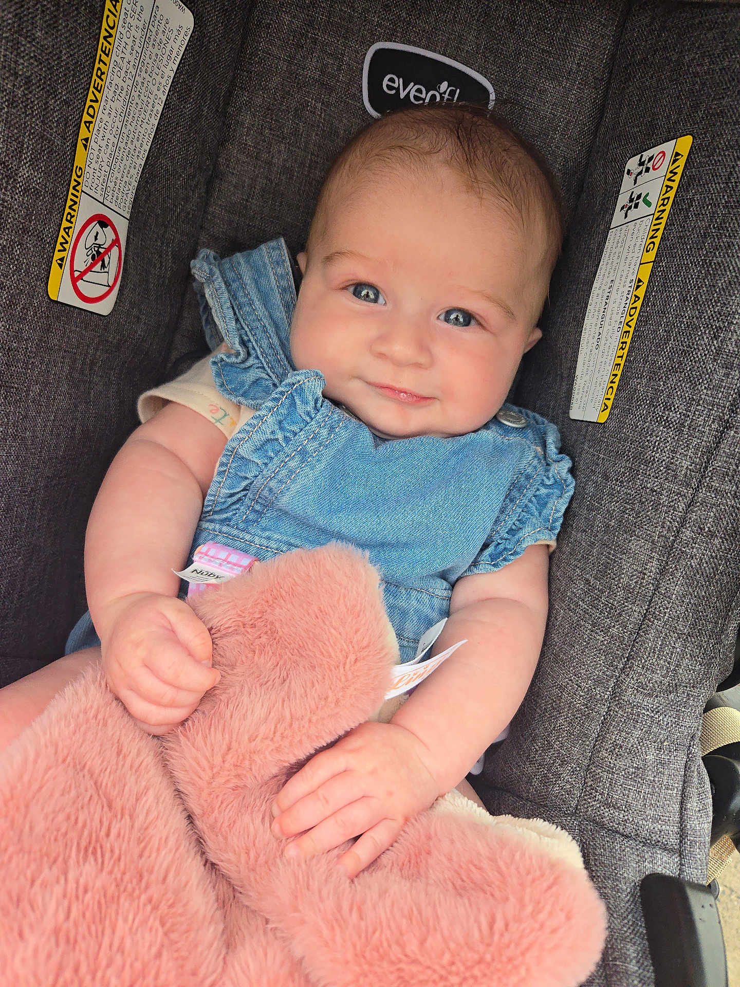 Sophia joined the competition — help win amazing prizes! baby, infant, child, denim, blue_eyes, car_seat, blanket, pink, soft, cute, clothing, person, seat, child_seat, holding, smiling, face, skin, arm, hand