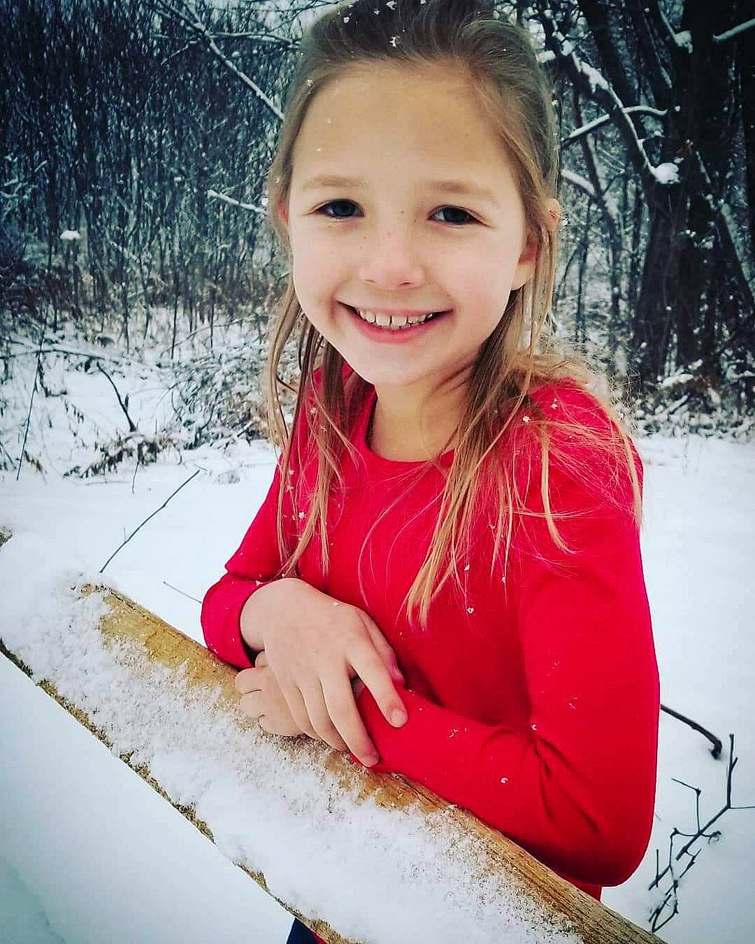 Aubrianna is registered to the contest to win money with this photo: beauty, child, child_model, eye, face, facial_expression, fun, happy, head, joy, lip, long_hair, person, photography, portrait, portrait_photography, sitting, smile, snow, tooth