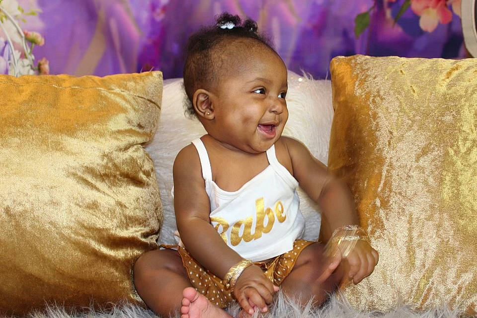 Kali joined the competition — help win amazing prizes! adaptation, baby, baby_toddler_clothing, child, event, face, flash_photography, fun, happy, iris, leisure, magenta, person, photograph, pink, purple, sitting, skin, smile, toddler