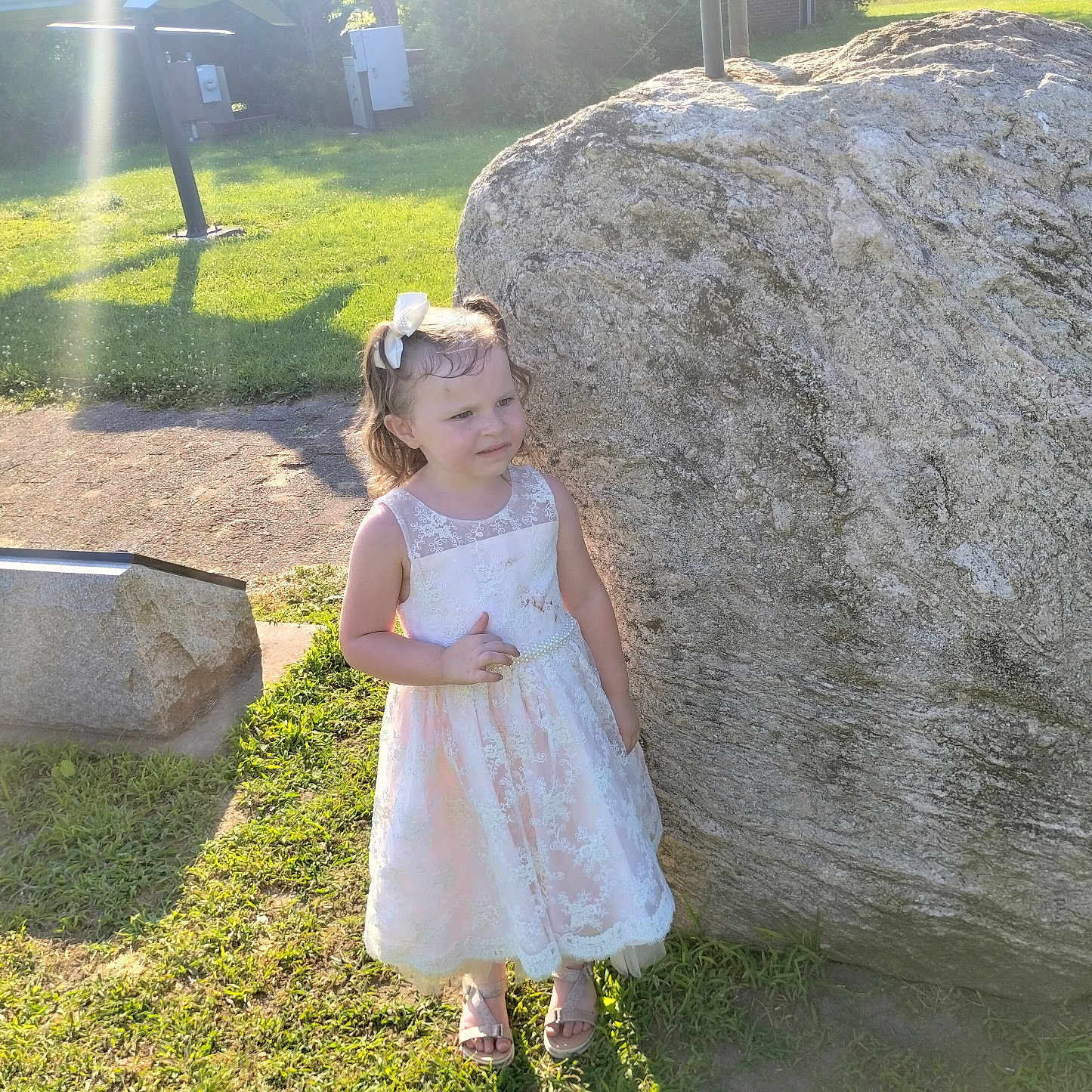 Kara is registered to the contest to win money with this photo: backyard, child, clothing, dress, face, fashion, female, formalwear, girl, gown, grass, head, nature, outdoors, park, person, photography, plant, portrait, rock