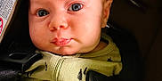 Hansen is registered to the contest to win money with this photo: baby, car, car_interior, carseat, clothing, coat, cushion, face, frown, head, homedecor, jacket, newborn, person, photography, portrait, sad, selfie, transportation, vehicle