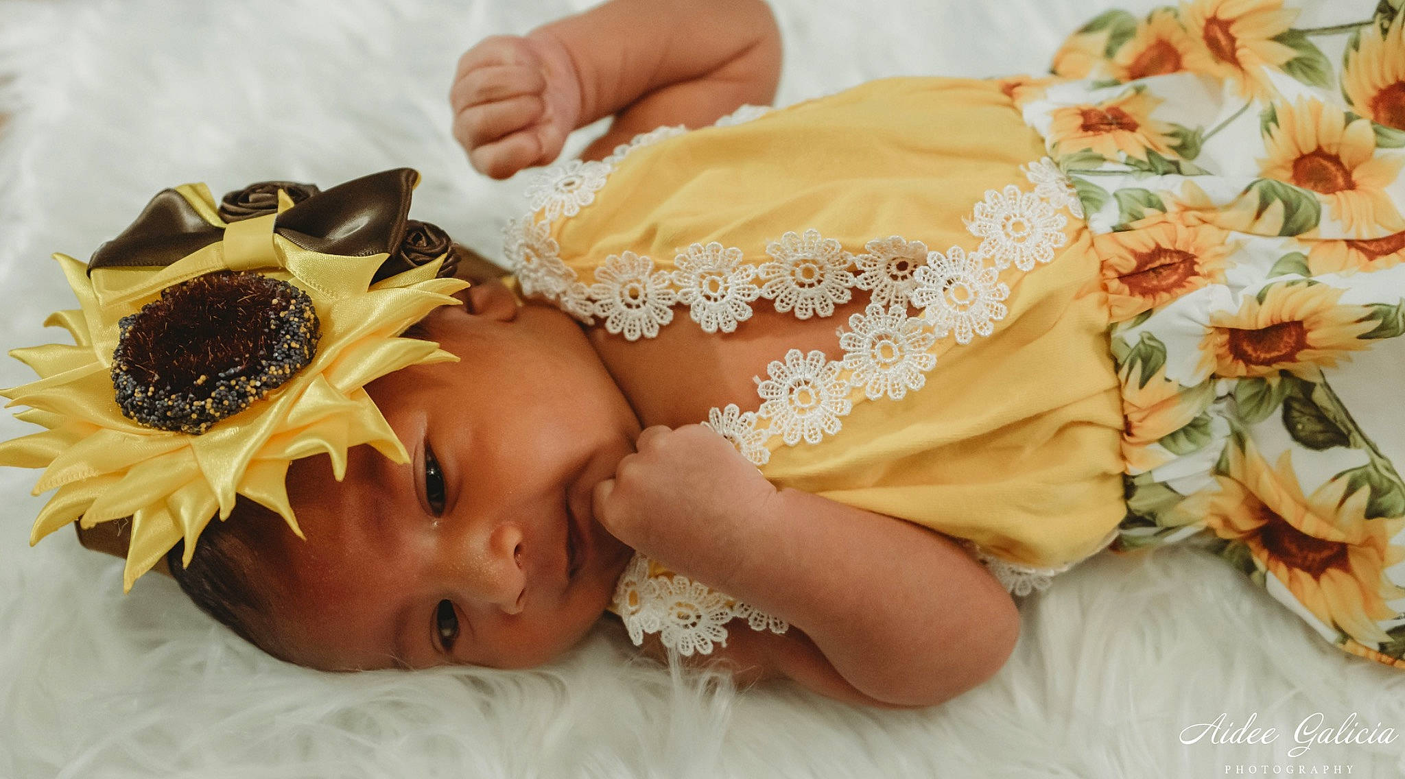 Mayah joined the competition — help win amazing prizes! baby, baby_sleeping, baby_toddler_clothing, child, fashion_accessory, flower, hair_accessory, headband, headgear, headpiece, person, toddler, yellow