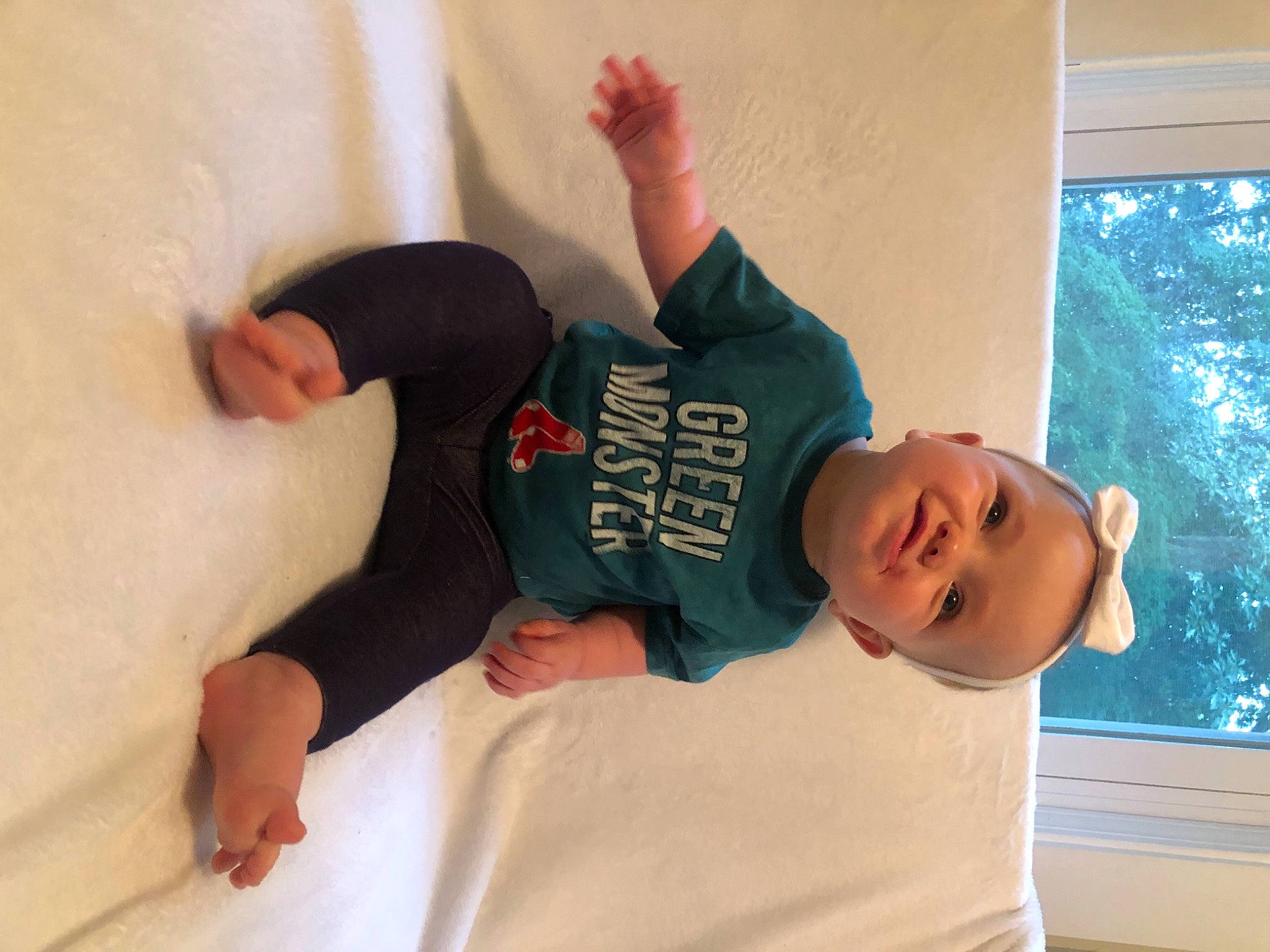 Lucia is registered to the contest to win money with this photo: comfort, elbow, finger, gesture, hairstyle, happy, human_body, joint, knee, leg, mouth, person, shoulder, sleeve, smile, t_shirt, thigh, thumb, toddler, trunk