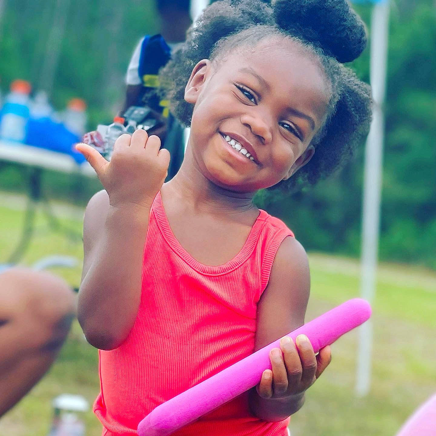 Amiyah joined the competition — help win amazing prizes! child, fun, gesture, grass, happy, joy, laugh, leisure, magenta, outdoor_play_equipment, people_in_nature, person, play, recreation, smile, sports, toddler, vacation