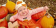 Bonnie Boo joined the competition — help win amazing prizes! baby, child, pumpkin, orange, hat, striped_clothing, tutu, fall, autumn, outdoor, smile, cute, festive, harvest, nature, person, seasonal, playful, socks, happy