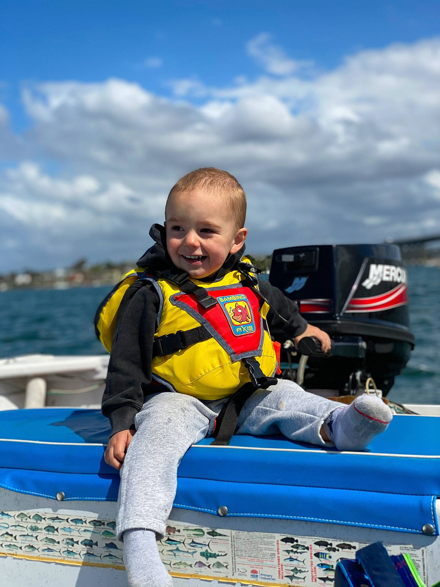 Kobi joined the competition — help win amazing prizes! baby_products, baby_toddler_clothing, boat, boats_and_boating_equipment_and_supplies, inflatable, joy, lifejacket, naval_architecture, person, personal_protective_equipment, water_transportation, watercraft, wetsuit