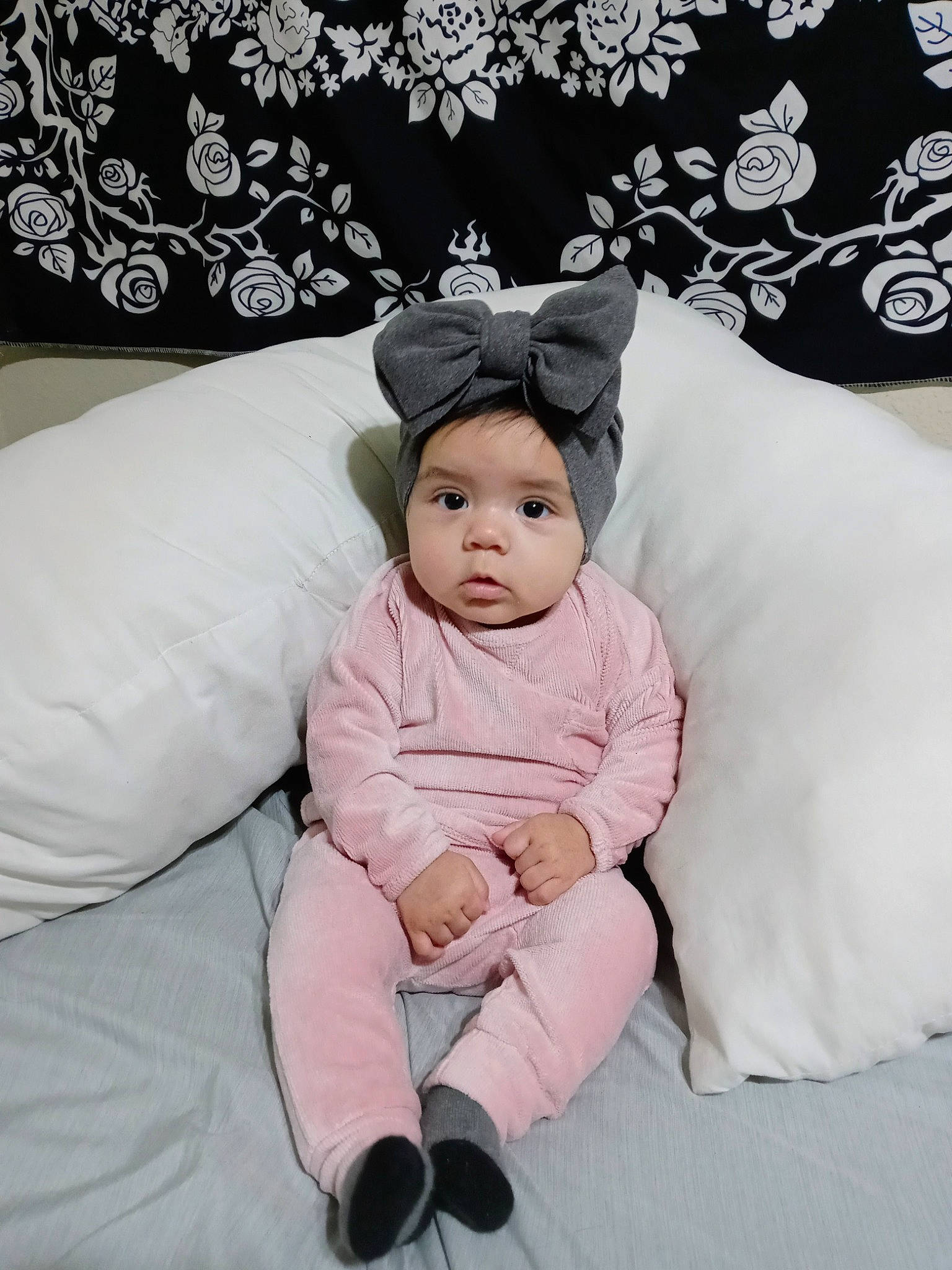 Anaya joined the competition — help win amazing prizes! baby, baby_toddler_clothing, cap, child, comfort, fashion_accessory, flash_photography, fur, happy, headgear, headwear, linens, magenta, pattern, person, pink, portrait_photography, sitting, sleeve, textile