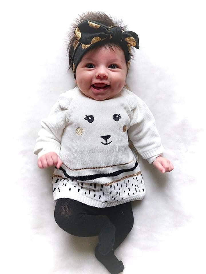 Maddy participe au concours pour gagner de l'argent avec cette photo : baby, baby_toddler_clothing, child, costume, eyelash, fashion_accessory, fur, gesture, happy, headgear, headwear, neck, outerwear, pattern, person, sitting, sleeve, smile, street_fashion, textile