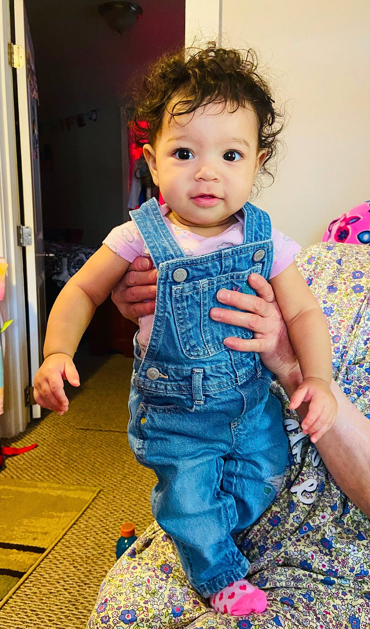 Amiyah is registered to the contest to win money with this photo: baby, baby_toddler_clothing, blue, cheek, child, electric_blue, eyelash, face, fashion_design, flooring, fun, happy, iris, pattern, person, play, sitting, skin, sleeve, t_shirt