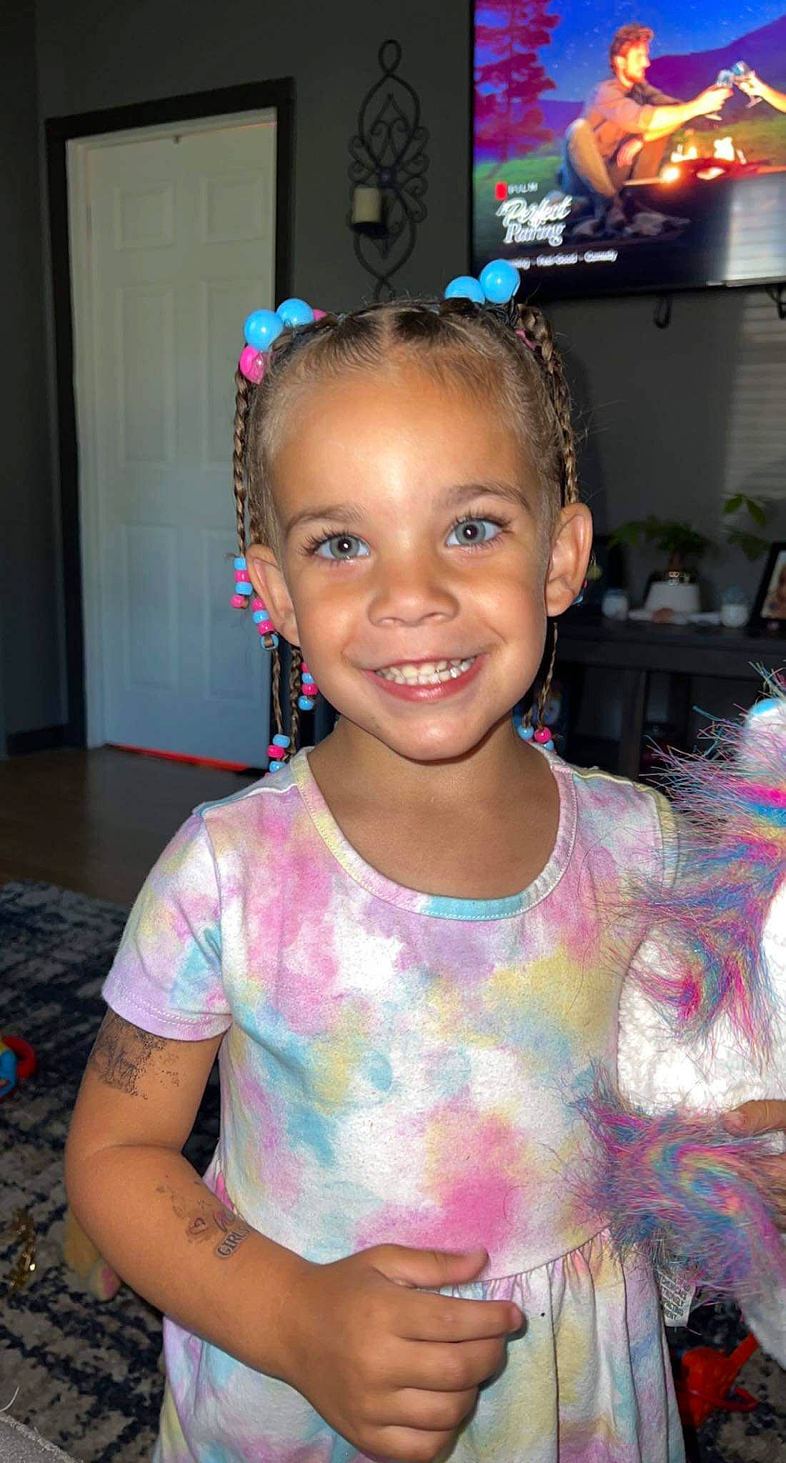 Kambrie is registered to the contest to win money with this photo: black_hair, blurred, cheek, child, ear, event, eyebrow, eyelash, flash_photography, forehead, fun, hairstyle, happy, iris, jewellery, joy, leisure, necklace, person, pink