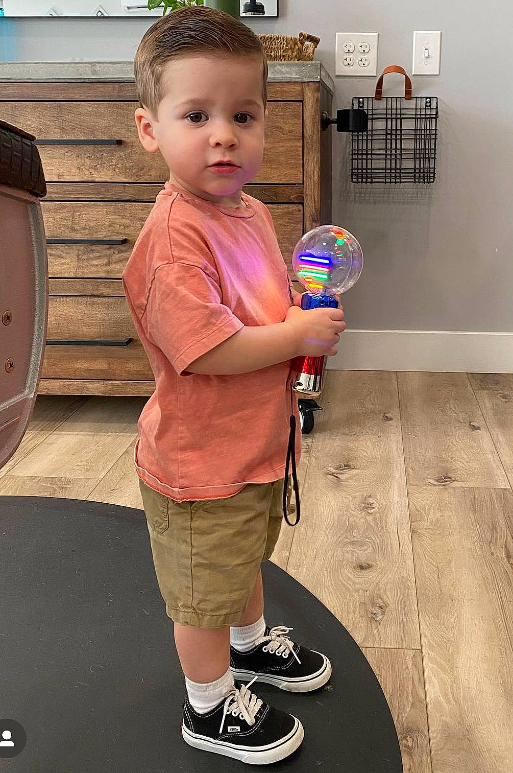 Jaxon is registered to the contest to win money with this photo: boy, child, clothing, electricaldevice, face, food, footwear, head, male, person, photography, portrait, racket, shoe, shorts, sleeve, sport, switch, tennis, tennisracket