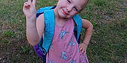 Vera Grace is registered to the contest to win money with this photo: backyard, bag, child, clothing, dress, face, female, girl, grass, head, lawn, nature, outdoors, park, person, photography, plant, portrait, summer, yard