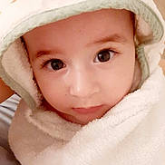 Amir participe au concours pour gagner de l'argent avec cette photo : child, baby, face, eyes, towel, hood, soft, closeup, portrait, cute, skin, expression, indoor, young, person, babywear, blanket, comfort, warm, innocent