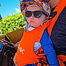 Walter joined the competition — help win amazing prizes! baby, adult, sunglasses, hat, orange_baby_carrier, blue_sky, greenery, outdoor, sunny, person, beard, cartoon_hat, child, casual_clothing, portrait, summer, bright_colors, babywearing, cool, fashion