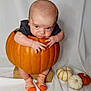 Kruz joined the competition — help win amazing prizes! autumn, baby, block, child, clothing, costume, cute, decor, fall, hands, infant, legs, orange, portrait, pumpkin, seasonal, small_pumpkins, striped_socks, studio, white_backdrop