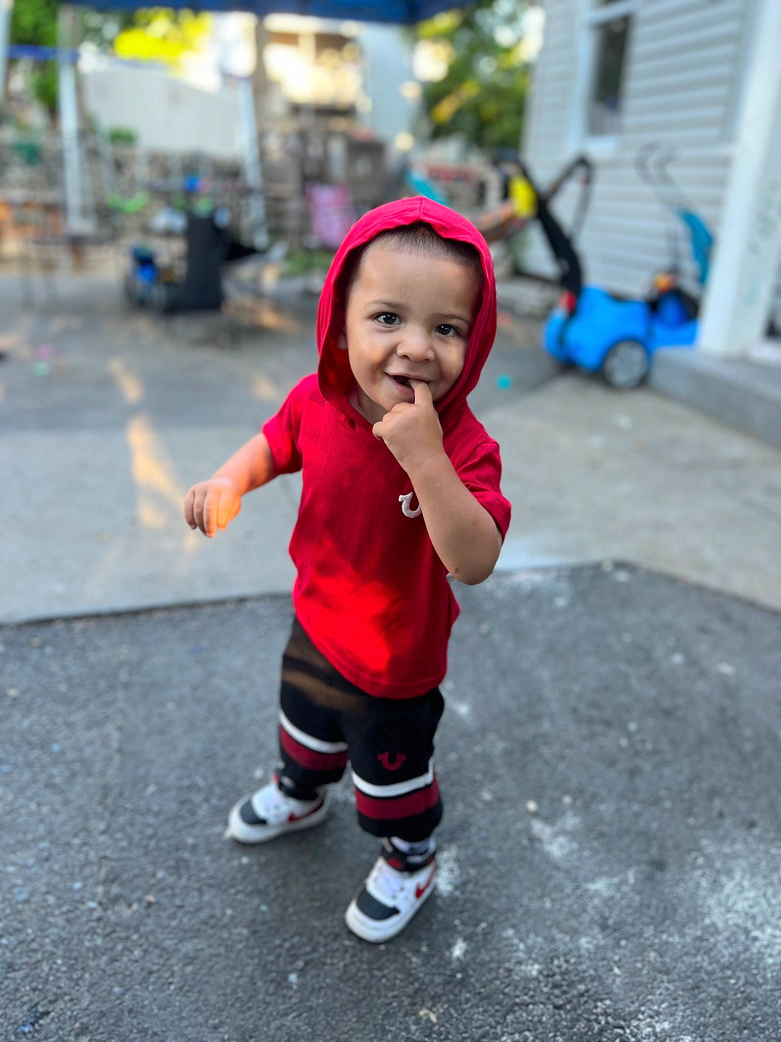 Jovanni joined the competition — help win amazing prizes! asphalt, baby_toddler_clothing, blue, eye, footwear, happy, hat, joy, person, public_space, recreation, road, road_surface, shoe, shorts, sleeve, smile, sneakers, t_shirt, tire