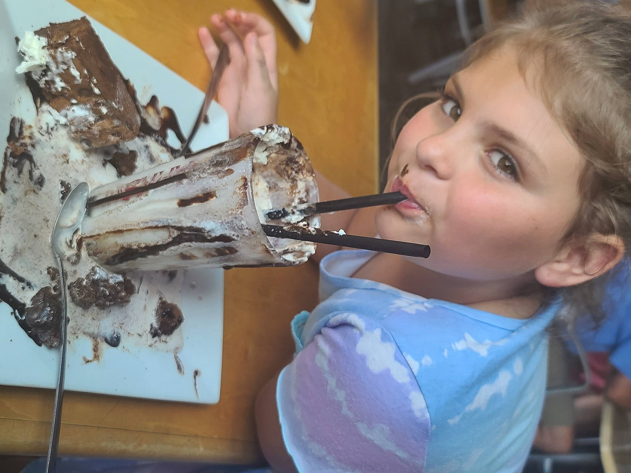 Samantha is registered to the contest to win money with this photo: art, comfort_food, cuisine, cutlery, dish, eyelash, food, fork, kitchen_utensil, metal, person, plate, recipe, smile, tableware, toddler, visual_arts