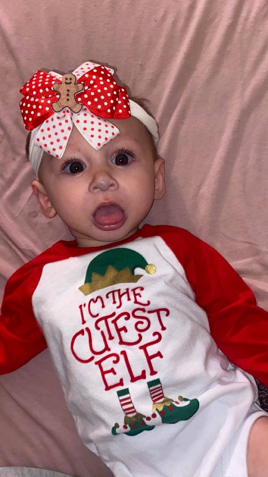 Vira is registered to the contest to win money with this photo: baby, baby_toddler_clothing, cap, carmine, child, costume_hat, event, eyebrow, eyelash, facial_expression, fashion_accessory, fun, happy, headband, headpiece, headwear, lip, pattern, person, sleeve