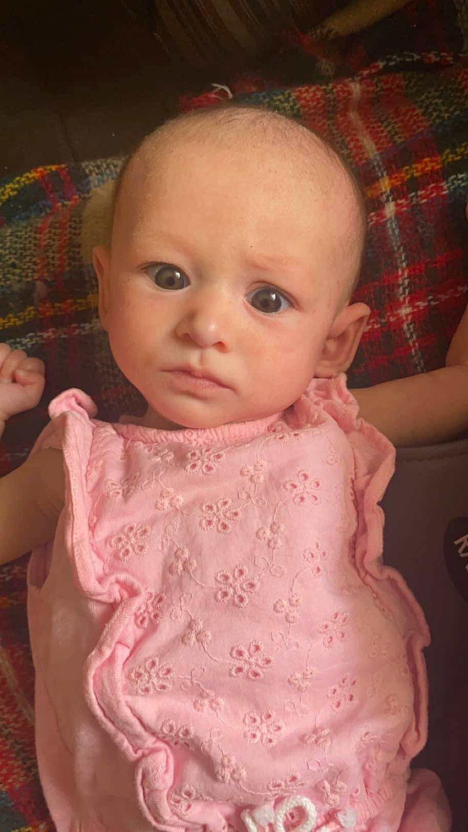 Vira joined the competition — help win amazing prizes! baby, baby_toddler_clothing, cheek, child, chin, dress, embellishment, eyebrow, eyelash, iris, lip, mouth, neck, nose, person, pink, skin, sleeve, tartan, textile